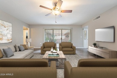 This updated and beautiful 3-bedroom home is move in ready with on Sun City Lakes West and East in Arizona - for sale on GolfHomes.com, golf home, golf lot