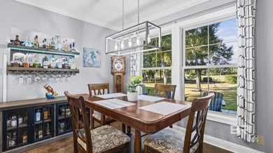 Elevate your vision of paradise in this stunning, 4BR/4BA on Peninsula Golf and Racquet Club in Alabama - for sale on GolfHomes.com, golf home, golf lot