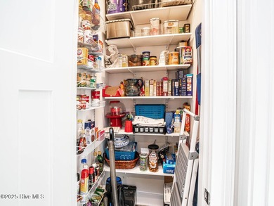 Prime Location in Sea Trail Plantation! This beautiful 4-bedroom on Sea Trail Golf Resort in North Carolina - for sale on GolfHomes.com, golf home, golf lot