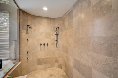 One or more photo(s) has been virtually staged. Set on a private on The Oaks Club in Florida - for sale on GolfHomes.com, golf home, golf lot