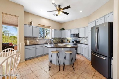 Welcome to an enchanting golf course villa situated within the on Verde Santa Fe Golf Club in Arizona - for sale on GolfHomes.com, golf home, golf lot