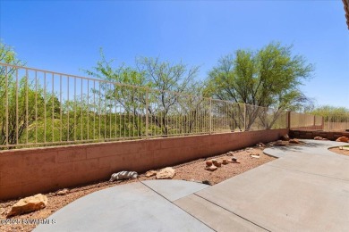 Welcome to an enchanting golf course villa situated within the on Verde Santa Fe Golf Club in Arizona - for sale on GolfHomes.com, golf home, golf lot