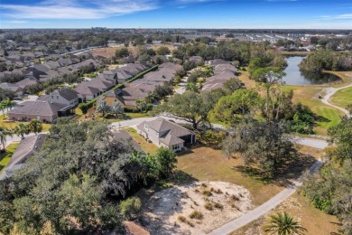 Fall in love with this beautifully updated two-story residence on Ridgewood Lakes Golf and Country Club in Florida - for sale on GolfHomes.com, golf home, golf lot