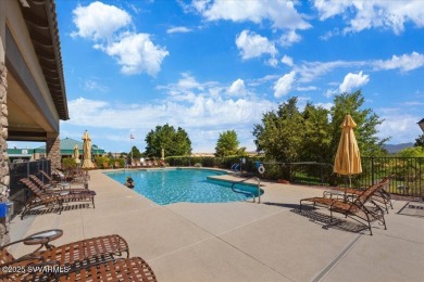 Welcome to an enchanting golf course villa situated within the on Verde Santa Fe Golf Club in Arizona - for sale on GolfHomes.com, golf home, golf lot
