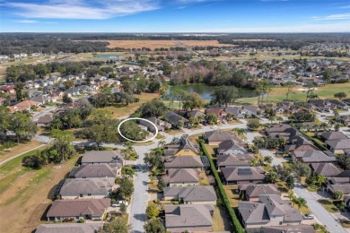 Fall in love with this beautifully updated two-story residence on Ridgewood Lakes Golf and Country Club in Florida - for sale on GolfHomes.com, golf home, golf lot