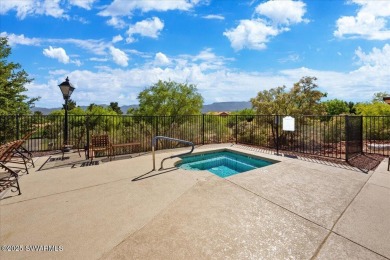 Welcome to an enchanting golf course villa situated within the on Verde Santa Fe Golf Club in Arizona - for sale on GolfHomes.com, golf home, golf lot