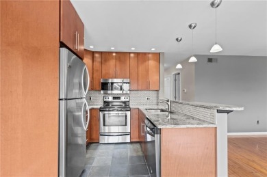Don't miss out on this updated condo overlooking the peaceful on Louisquisset Golf Club in Rhode Island - for sale on GolfHomes.com, golf home, golf lot