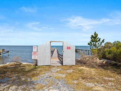 Welcome to Cabana Beach. Discover an exceptionally large coastal on Kiva Dunes Golf Club in Alabama - for sale on GolfHomes.com, golf home, golf lot
