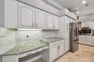 Under contract-accepting backup offers. Exquisite and with on East Lake Woodlands Country Club in Florida - for sale on GolfHomes.com, golf home, golf lot