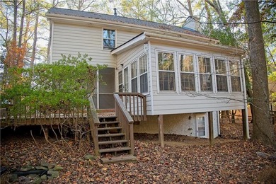 The master and two additional bedrooms are located on the second on Horseshoe Bend Country Club in Georgia - for sale on GolfHomes.com, golf home, golf lot