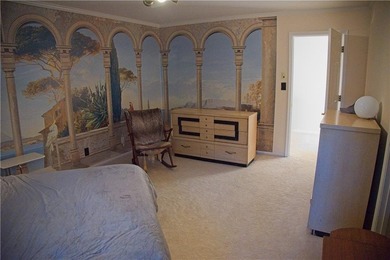 The master and two additional bedrooms are located on the second on Horseshoe Bend Country Club in Georgia - for sale on GolfHomes.com, golf home, golf lot