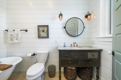 Custom-built Coastal Modern Farmhouse with breathtaking views of on The Plantation Course At Edisto in South Carolina - for sale on GolfHomes.com, golf home, golf lot