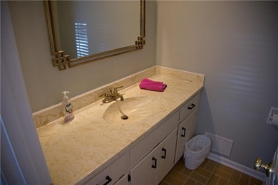 The master and two additional bedrooms are located on the second on Horseshoe Bend Country Club in Georgia - for sale on GolfHomes.com, golf home, golf lot