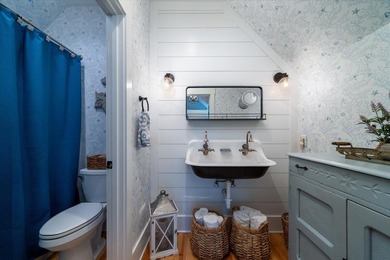 Custom-built Coastal Modern Farmhouse with breathtaking views of on The Plantation Course At Edisto in South Carolina - for sale on GolfHomes.com, golf home, golf lot