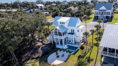 Custom-built Coastal Modern Farmhouse with breathtaking views of on The Plantation Course At Edisto in South Carolina - for sale on GolfHomes.com, golf home, golf lot