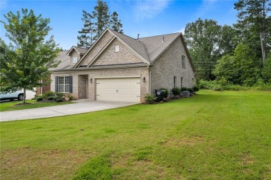 Welcome to 137 Golden Eagle Lane, where comfort meets elegance on Cobbs Glen Country Club in South Carolina - for sale on GolfHomes.com, golf home, golf lot