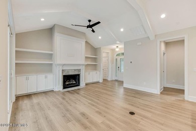 This brand new Riptide home with stunning setting and finishes on Sea Trail Golf Resort in North Carolina - for sale on GolfHomes.com, golf home, golf lot