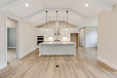 This brand new Riptide home with stunning setting and finishes on Sea Trail Golf Resort in North Carolina - for sale on GolfHomes.com, golf home, golf lot