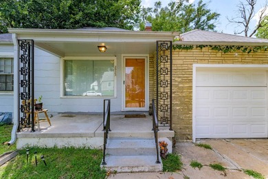 Welcome home to this charming 3-bedroom home with a spacious on L W Clapp Memorial Golf Course in Kansas - for sale on GolfHomes.com, golf home, golf lot