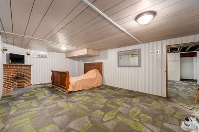 Welcome home to this charming 3-bedroom home with a spacious on L W Clapp Memorial Golf Course in Kansas - for sale on GolfHomes.com, golf home, golf lot