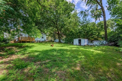 Welcome home to this charming 3-bedroom home with a spacious on L W Clapp Memorial Golf Course in Kansas - for sale on GolfHomes.com, golf home, golf lot