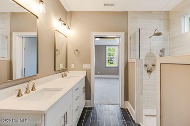 This brand new Riptide home with stunning setting and finishes on Sea Trail Golf Resort in North Carolina - for sale on GolfHomes.com, golf home, golf lot