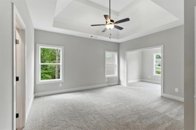 Welcome Home to 29 Creekview Drive! This stunning Alexander on The Plantation Golf Club in Georgia - for sale on GolfHomes.com, golf home, golf lot