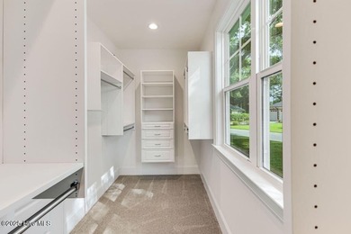 This brand new Riptide home with stunning setting and finishes on Sea Trail Golf Resort in North Carolina - for sale on GolfHomes.com, golf home, golf lot