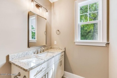 This brand new Riptide home with stunning setting and finishes on Sea Trail Golf Resort in North Carolina - for sale on GolfHomes.com, golf home, golf lot