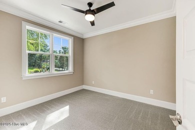 This brand new Riptide home with stunning setting and finishes on Sea Trail Golf Resort in North Carolina - for sale on GolfHomes.com, golf home, golf lot