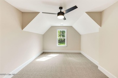 This brand new Riptide home with stunning setting and finishes on Sea Trail Golf Resort in North Carolina - for sale on GolfHomes.com, golf home, golf lot