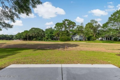 This brand new Riptide home with stunning setting and finishes on Sea Trail Golf Resort in North Carolina - for sale on GolfHomes.com, golf home, golf lot