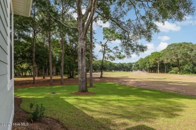 This brand new Riptide home with stunning setting and finishes on Sea Trail Golf Resort in North Carolina - for sale on GolfHomes.com, golf home, golf lot
