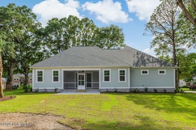 This brand new Riptide home with stunning setting and finishes on Sea Trail Golf Resort in North Carolina - for sale on GolfHomes.com, golf home, golf lot