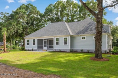 This brand new Riptide home with stunning setting and finishes on Sea Trail Golf Resort in North Carolina - for sale on GolfHomes.com, golf home, golf lot