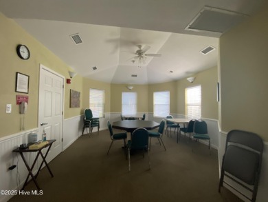 This brand new Riptide home with stunning setting and finishes on Sea Trail Golf Resort in North Carolina - for sale on GolfHomes.com, golf home, golf lot