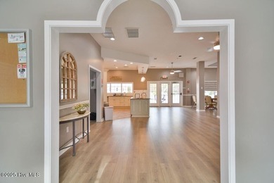 This brand new Riptide home with stunning setting and finishes on Sea Trail Golf Resort in North Carolina - for sale on GolfHomes.com, golf home, golf lot