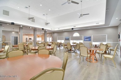 This brand new Riptide home with stunning setting and finishes on Sea Trail Golf Resort in North Carolina - for sale on GolfHomes.com, golf home, golf lot