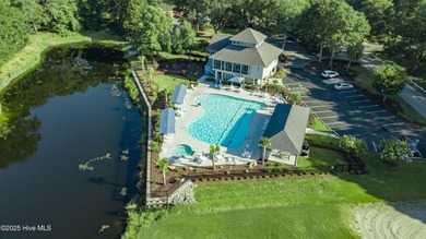 This brand new Riptide home with stunning setting and finishes on Sea Trail Golf Resort in North Carolina - for sale on GolfHomes.com, golf home, golf lot