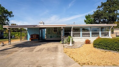 **TWO SUN PORCHES, NO REAR NEIGHBORS!**

Step into your own on Bay Tree Golf Course in Florida - for sale on GolfHomes.com, golf home, golf lot