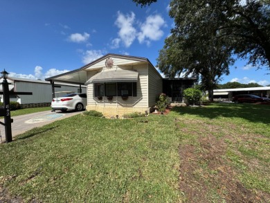 There is tons of space inside & out in this 2/2 sanctuary! It is on Lake Henry Golf Club in Florida - for sale on GolfHomes.com, golf home, golf lot