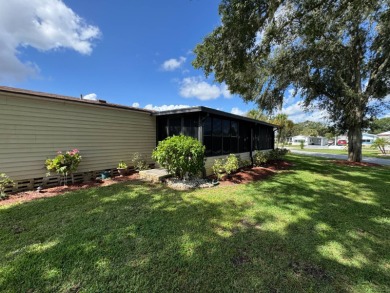 There is tons of space inside & out in this 2/2 sanctuary! It is on Lake Henry Golf Club in Florida - for sale on GolfHomes.com, golf home, golf lot