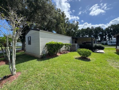 There is tons of space inside & out in this 2/2 sanctuary! It is on Lake Henry Golf Club in Florida - for sale on GolfHomes.com, golf home, golf lot