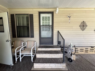 There is tons of space inside & out in this 2/2 sanctuary! It is on Lake Henry Golf Club in Florida - for sale on GolfHomes.com, golf home, golf lot