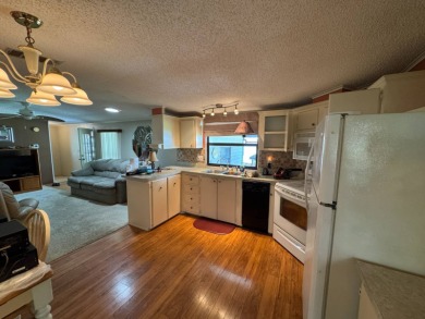 There is tons of space inside & out in this 2/2 sanctuary! It is on Lake Henry Golf Club in Florida - for sale on GolfHomes.com, golf home, golf lot