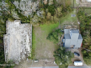 Build your beach house on this lovely lot with marsh views and on Oak Island Golf Club in North Carolina - for sale on GolfHomes.com, golf home, golf lot