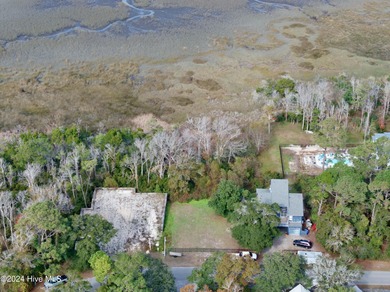 Build your beach house on this lovely lot with marsh views and on Oak Island Golf Club in North Carolina - for sale on GolfHomes.com, golf home, golf lot