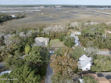 Build your beach house on this lovely lot with marsh views and on Oak Island Golf Club in North Carolina - for sale on GolfHomes.com, golf home, golf lot