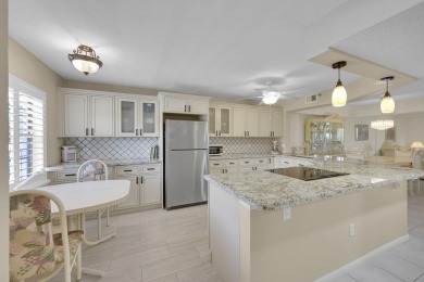 Welcome home to this beautifully renovated 2 bedroom, 2 bathroom on Boca Dunes Golf and Country Club in Florida - for sale on GolfHomes.com, golf home, golf lot