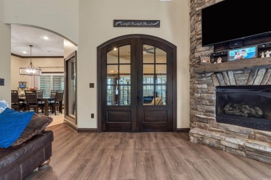 Stunning updated executive home with sunroom and screened porch on Sage Meadows Golf Course in Arkansas - for sale on GolfHomes.com, golf home, golf lot